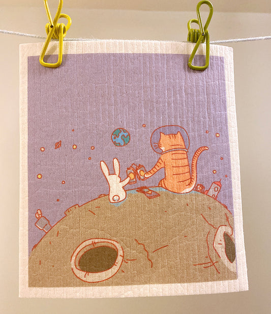 Cat and bunny on a planet wood pulp and cotton Swedish dishcloth